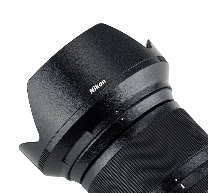 Kiwifotos Skin för Nikon Nikkor Z 24-70mm f/4 S - Svart Lädertextur